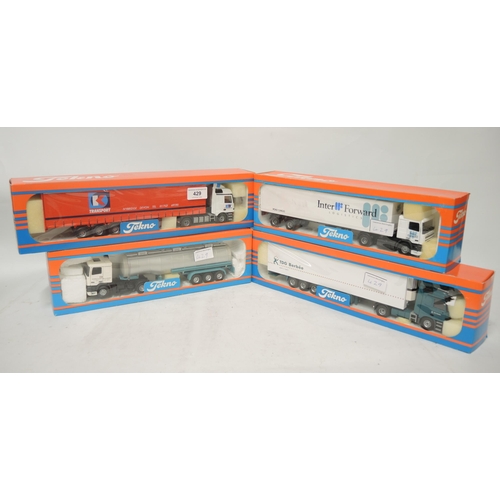 429 - Group of four Tecno 1:50 scale boxed model trucks