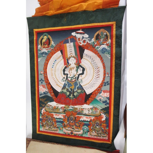 49 - Two large modern hand painted Tibetan Thangkas, the largest 112 x 80cm approximately, excluding the ... 