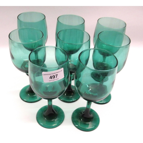 497 - Set of eight green tinted wine glasses, 18cm high