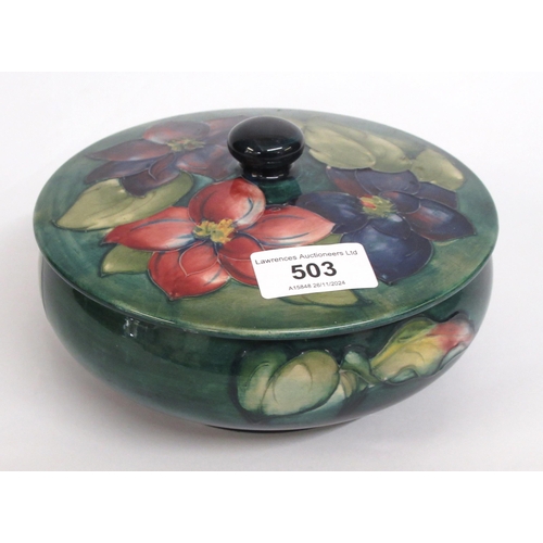 503 - Moorcroft, circular bowl and cover with floral tubeline decoration on a blue / green ground, 18cm di... 