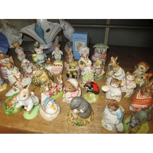 575 - Group of forty five Beatrix Potter figures by Beswick and Royal Albert