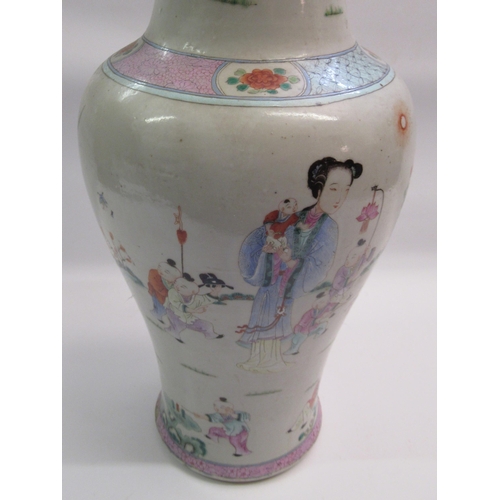 589 - 19th Century Canton famille rose baluster form vase painted with various figures in landscapes, 48cm... 