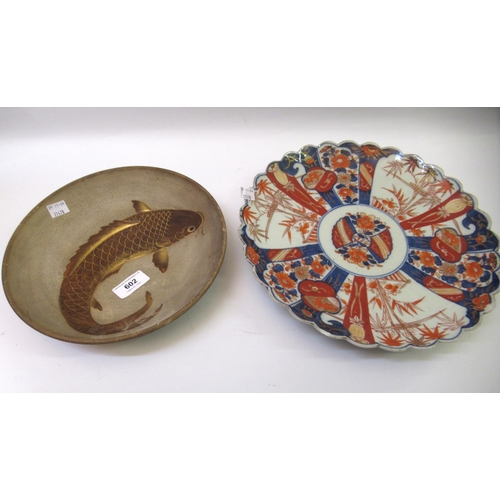 602 - Japanese Satsuma dish decorated with a koi carp on a biscuit ground 24cm diameter, together with an ... 