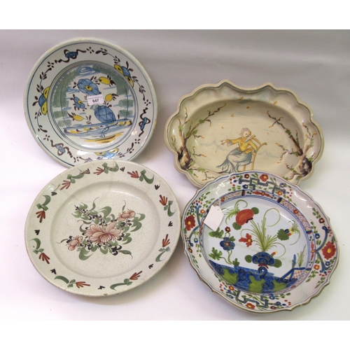 647 - Four various antique Continental Delftware and majolica dishes, the largest 37cm wide