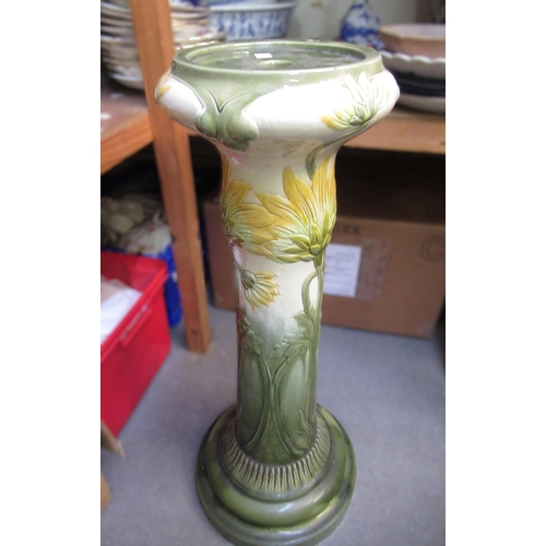 652 - Burmantofts faience pottery jardiniere stand with stylised floral decoration, 74cm high