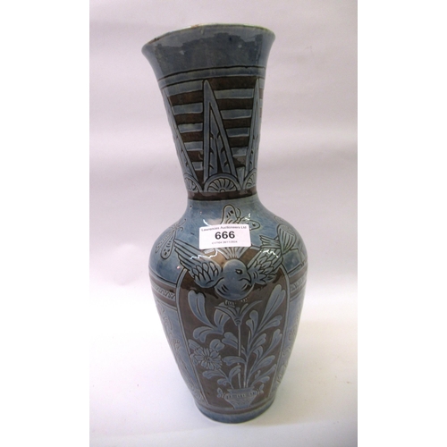 666 - Blue glazed pottery baluster form vase decorated in aesthetic style, 32cm high