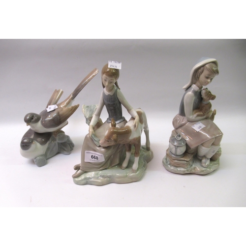 668 - Group of three various Lladro porcelain figures