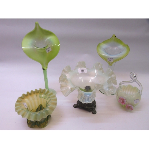 690 - Vaseline glass epergne and tazza, two ' Jack in the Pulpit ' vases and two others