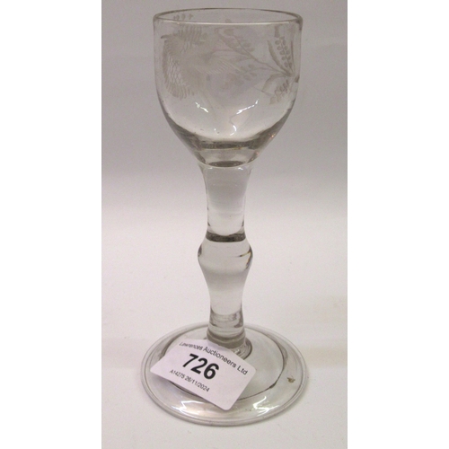 726 - 18th Century baluster stem wine glass, the bowl etched with a flower and a bird, with a folded foot,... 