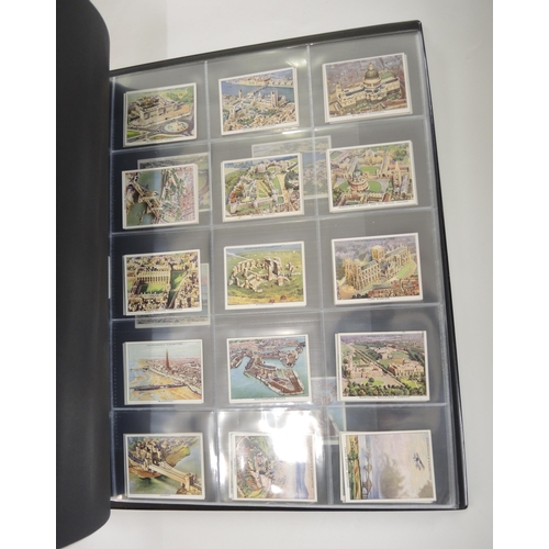 74 - One album of Churchman cigarette cards, including Lawn Tennis, World Wonders etc.