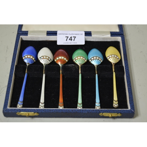 747 - Cased set of six coloured enamel and silver coffee spoons