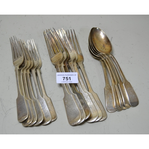 751 - Part canteen of Sheffield silver Fiddle pattern cutlery bearing family crest, comprising eleven spoo... 