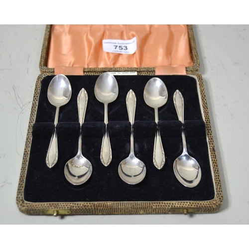 753 - Set of Birmingham silver coffee spoons in fitted box, a two handled plated trophy cup, a quantity of... 