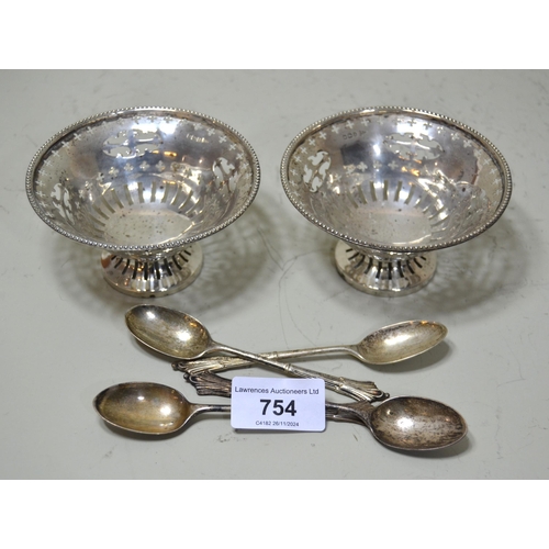 754 - Pair of Sheffield silver circular pierced pedestal bonbon dishes, four matching silver coffee spoons... 