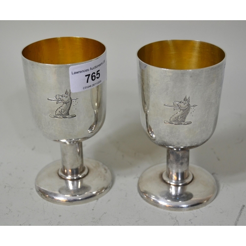 765 - Pair of London silver goblets with crest, makers mark R.J.J., 12.5oz t