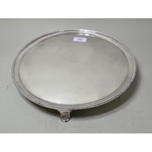 766 - George III Edinburgh circular silver salver with bead edge rim bearing crest of a dog, 28oz t