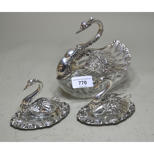 770 - Continental silver and cut glass table salt in the form of a swan, together with a pair of similar s... 