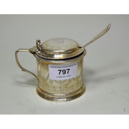 797 - Victorian silver drum form mustard with hinged lid and engraved floral decoration, together with an ... 