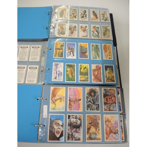 85 - Five albums containing a collection of various Brooke Bond trade cards