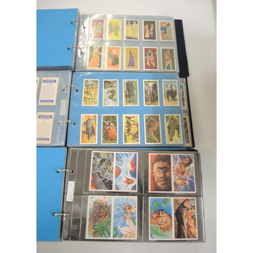 85 - Five albums containing a collection of various Brooke Bond trade cards