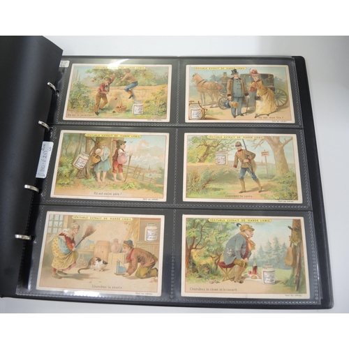 87 - Album containing thirty one sets of Liebig collectors cards