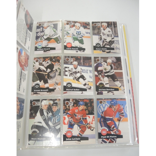 90 - Two albums containing Pro Set hockey, racing, together with another album containing Bowman 1991 Ame... 