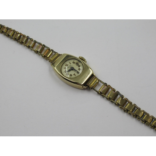 977 - 9ct Yellow gold ladies wristwatch with plated strap