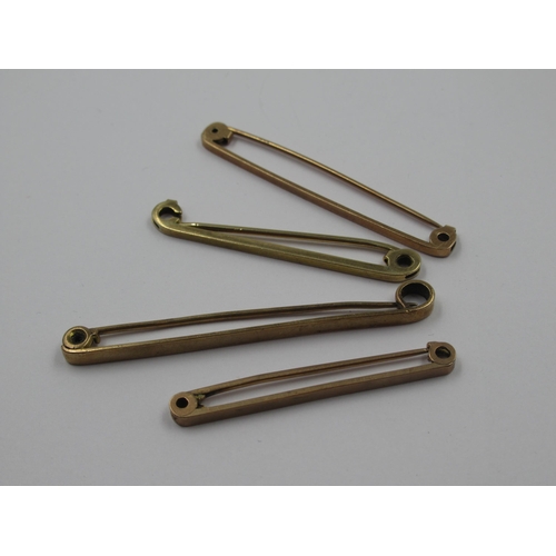 980 - Four 9ct yellow gold tie pins, 6.7g