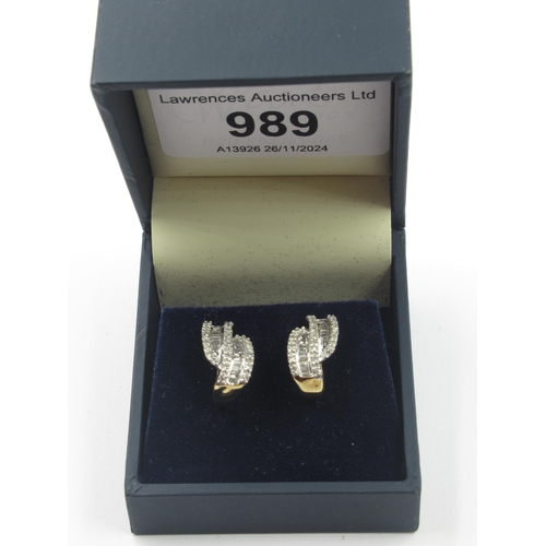 989 - Pair of 9ct yellow gold diamond set earrings