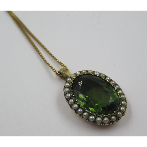 993 - Green stone and split seed pearl pendant on 9ct chain