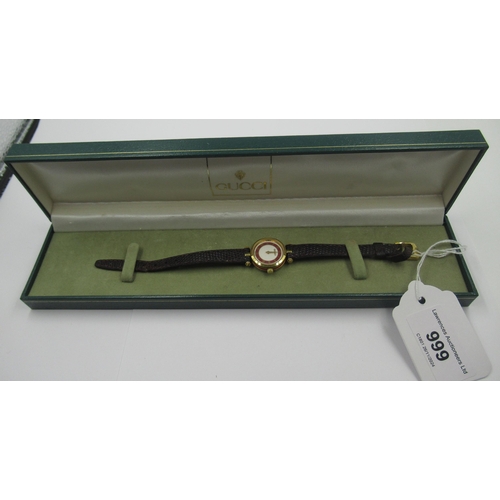 999 - Ladies Gucci quartz wristwatch, with original box and receipt