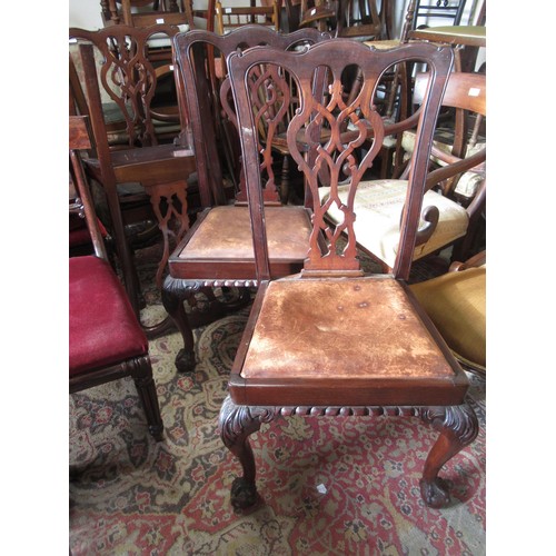 2034A - Set of four early 20th Century mahogany dining chairs in Chippendale style, the pierced splat backs ... 