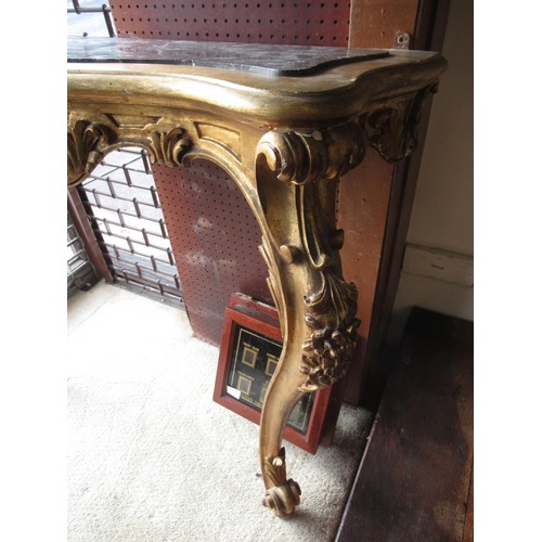 2034 - Early 20th Century carved and gilded console table, the shaped marble inset top above a pierced frie... 