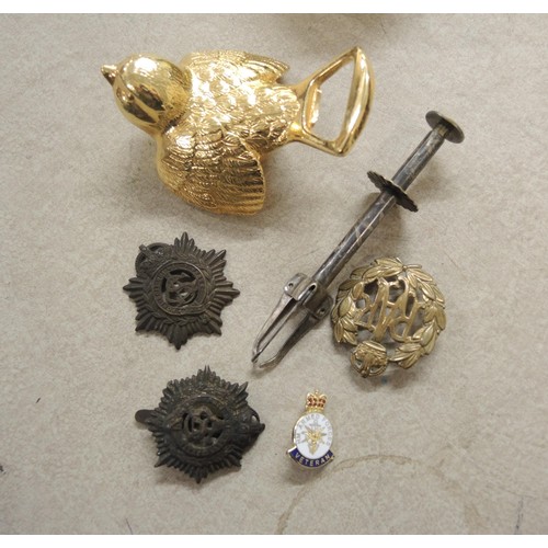 221 - Small quantity of miscellaneous items including military badges, whistle, two silver salt spoons, mi... 