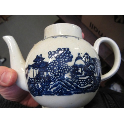 629 - 18th Century blue and white transfer printed teapot with associated cover, possibly Pennington (at f... 