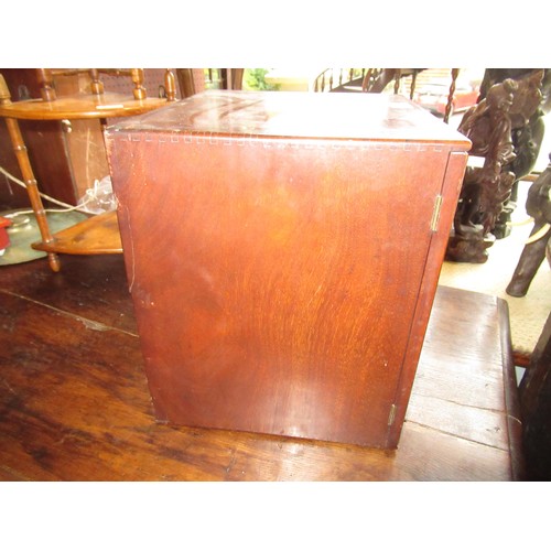 1814 - Small late 19th / early 20th Century mahogany four drawer table cabinet with side locking mechanism