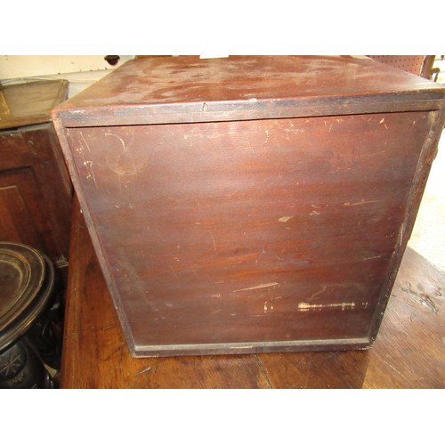 1814 - Small late 19th / early 20th Century mahogany four drawer table cabinet with side locking mechanism