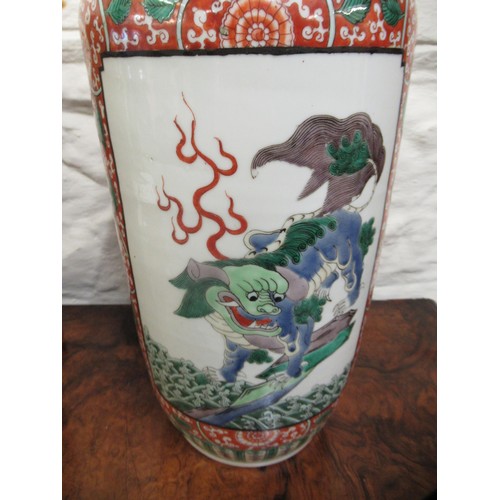 517 - Good Chinese famille verte vase with a narrow neck and baluster body painted with panels of dogs of ... 