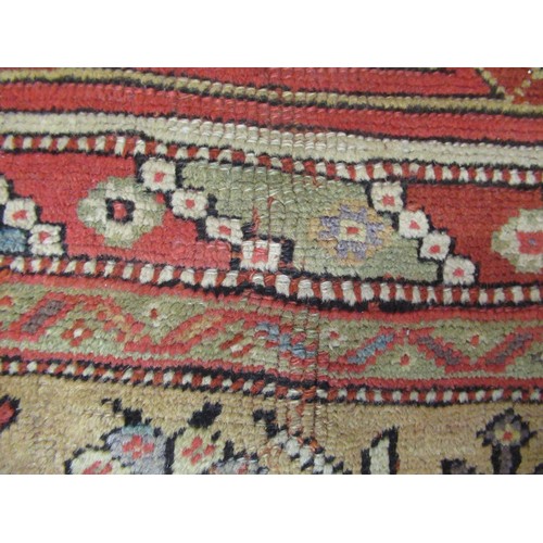 7 - Melas prayer rug with a small central Mihrab within a wide multiple border in typical pastel shades,... 