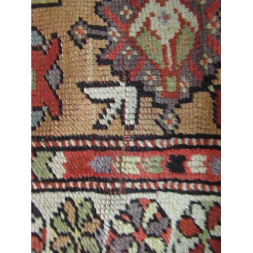 7 - Melas prayer rug with a small central Mihrab within a wide multiple border in typical pastel shades,... 