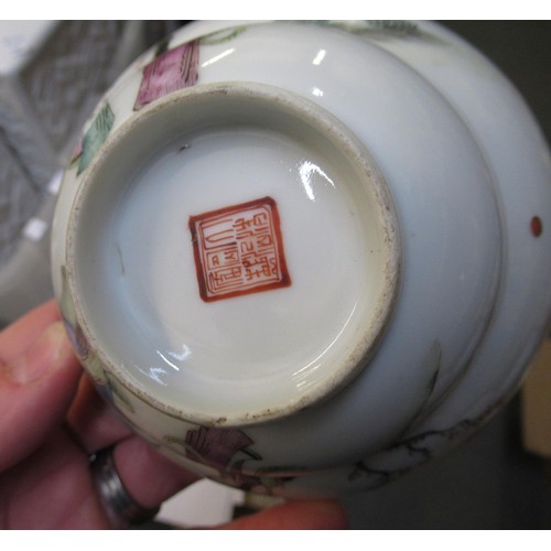 606 - Small Chinese famille rose bowl of double lobed design, painted red square character mark to the bas... 