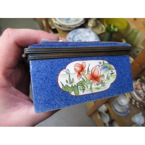 654 - Rectangular Continental stoneware casket painted with flowers, together with a pair of Eastern crack... 