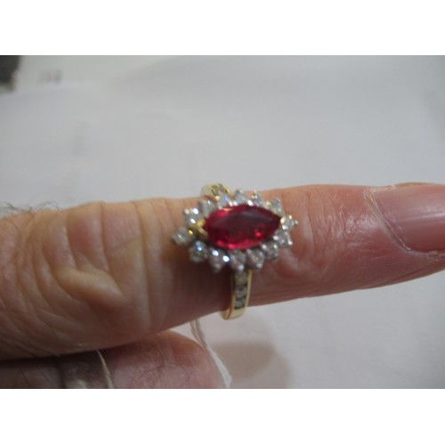 957 - 18ct Yellow gold ruby and diamond cluster ring, size K, 3.7g