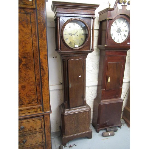 1585 - George III oak longcase clock, the square hood with circular window and flanking pilasters, above a ... 