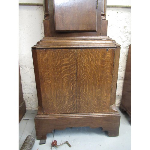 1585 - George III oak longcase clock, the square hood with circular window and flanking pilasters, above a ... 