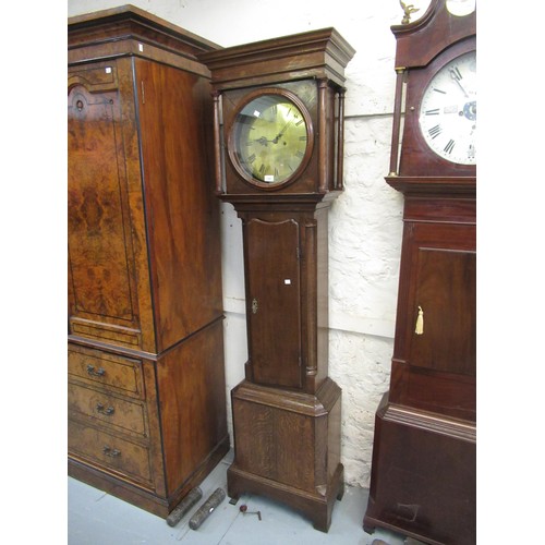 1585 - George III oak longcase clock, the square hood with circular window and flanking pilasters, above a ... 