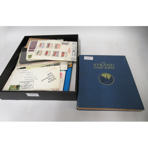 100A - The Strand stamp album, together with a quantity of loose stamps