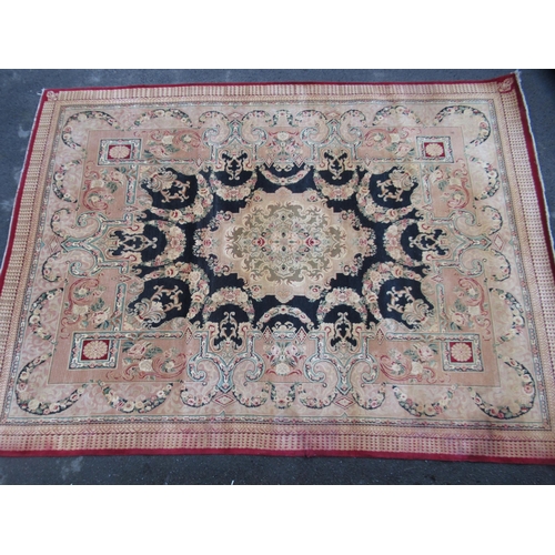 11 - Indo Persian carpet of European medallion and floral design on a beige ground with borders, 380 x 27... 