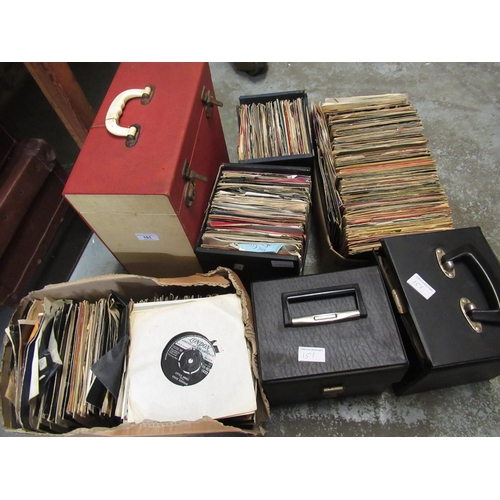 151 - Large collection in seven containers of various 45rpm records and a quantity of LP's