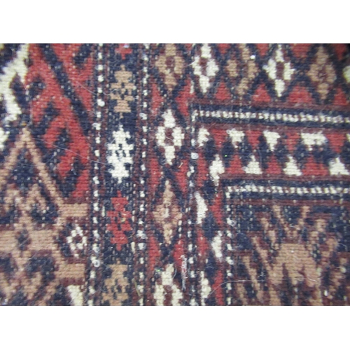 16 - Pakistan Bokhara rug of Turkoman design with multiple gols on a midnight blue ground with borders, 2... 